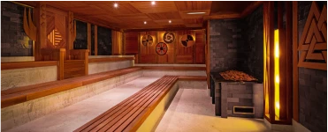 Valhalla Sauna at Suntago, wooden interior with Viking shields on the walls