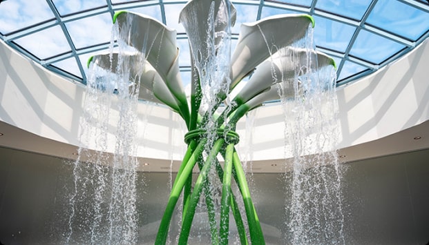 Shower in the shape of calla flowers in a sunny setting